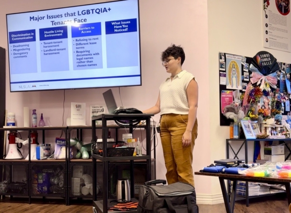 An NLSLA attorney hosts a presentation on LGBTQ+ rights at Somos Familia Valle.